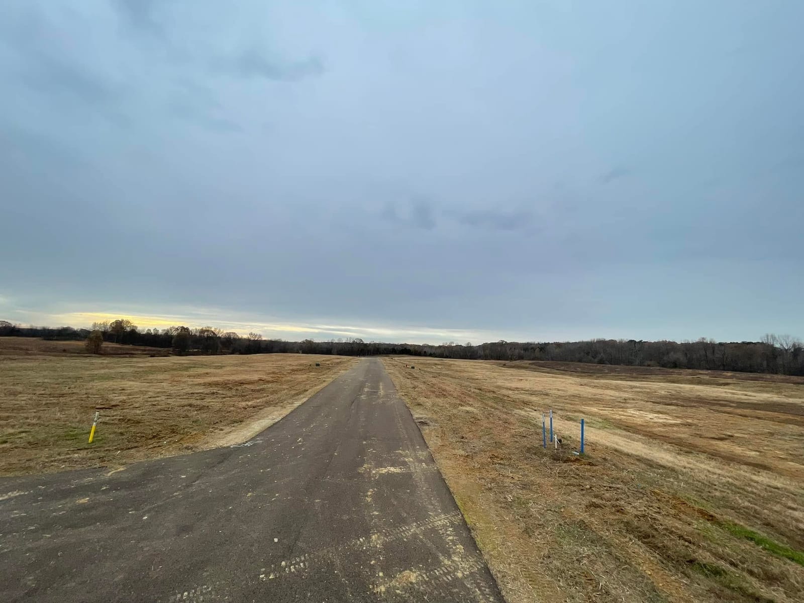 Bush hogging along a gravel drive — Brush Clearing & Bush Hogging in North Mississippi